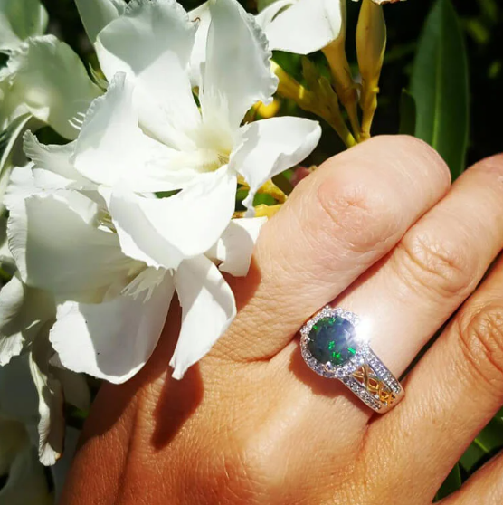 Sterling Silver Celtic Halo Ring With Green Cubic Zirconia