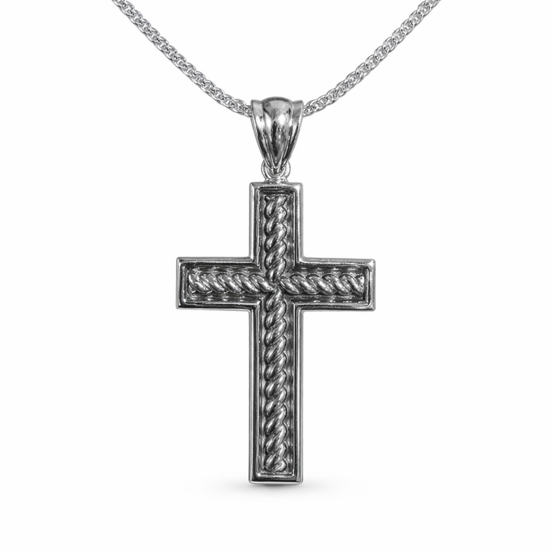Silver cross pendant necklace on a white background