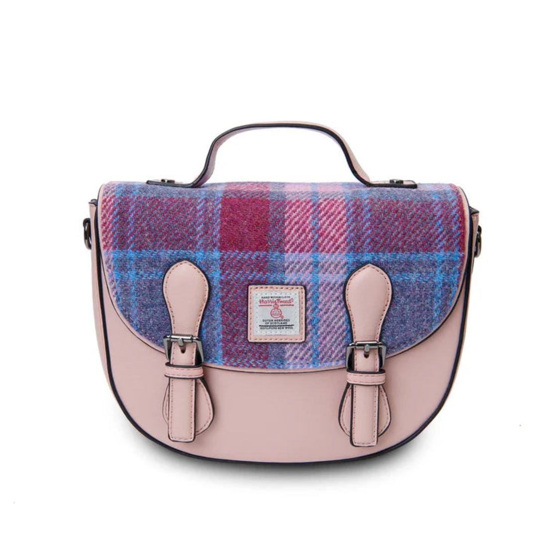 Plaid patterned bag with pink accents on a white background