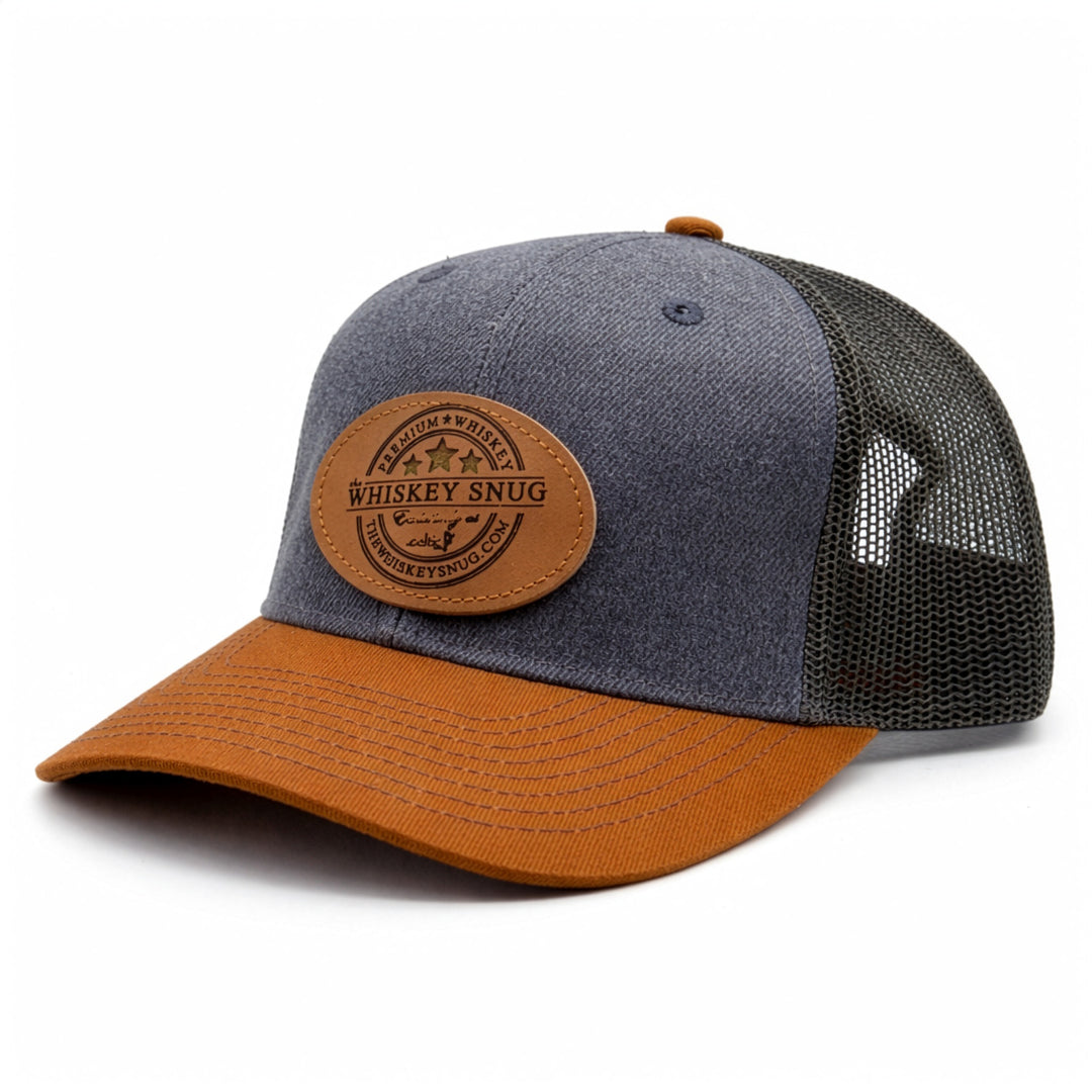 Blue and brown trucker cap with leather patch on a white background