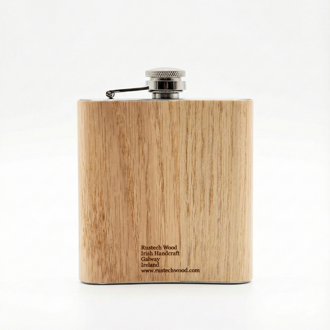Wooden flask with metallic cap on a white background