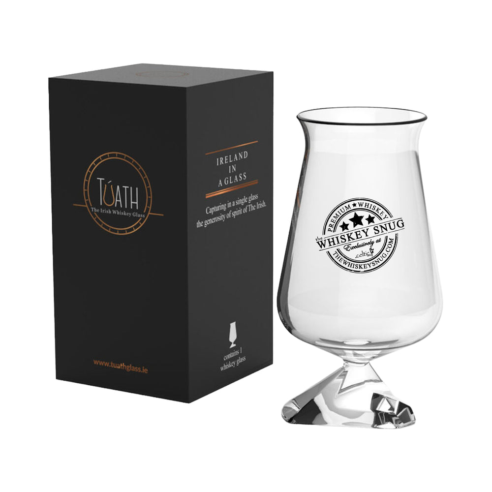 Whiskey glass with 'Whiskey Snug' branding next to a black box with the Tuath branding.