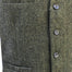 buttons and detail of olive green blended wool vest by celtic ranch