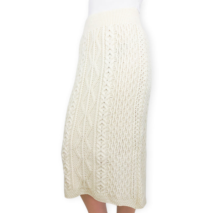 https://celticranch.com/cdn/shop/products/aran-woollen-mills-merino-wool-long-length-skirt-natural-side-model_700x700.jpg?v=1633111252