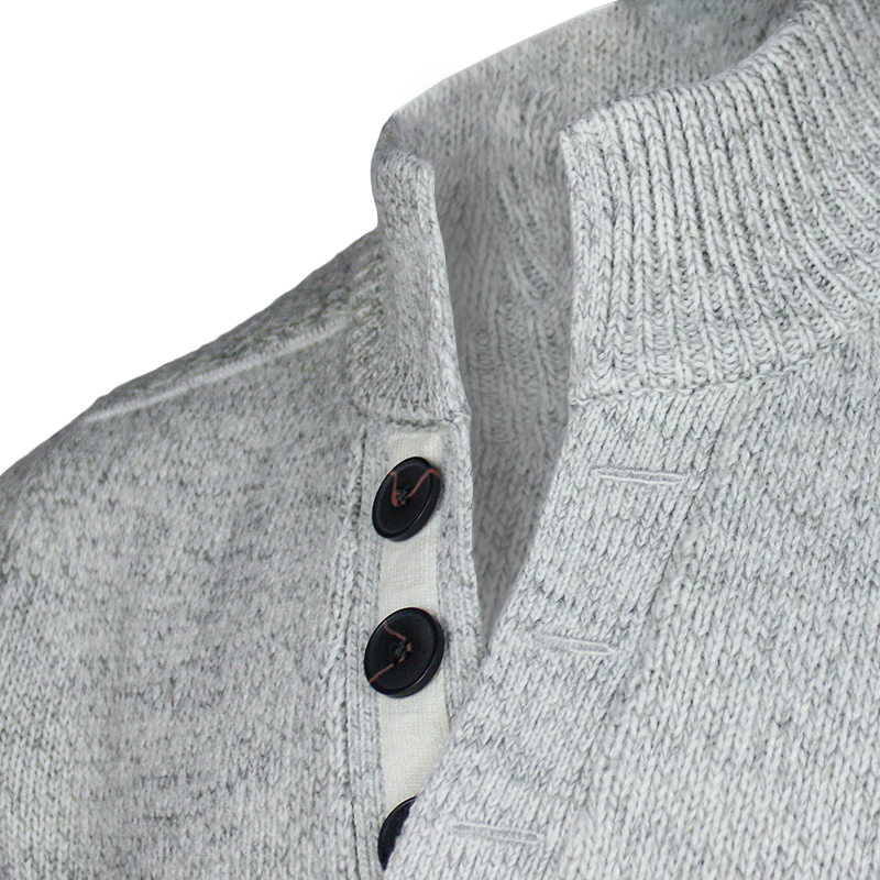 buttons close up of emerald isle winter white galway shawl collar sweater
