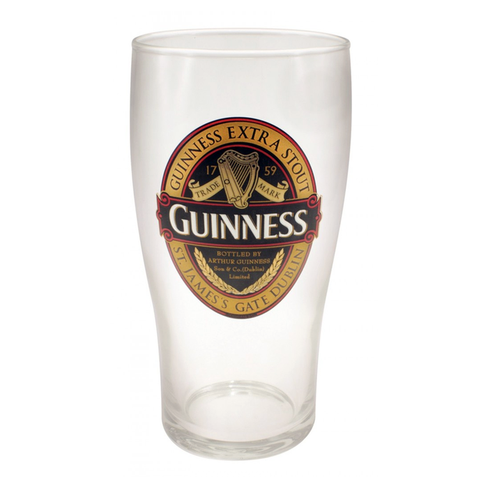 front of classic pint glass by guinness