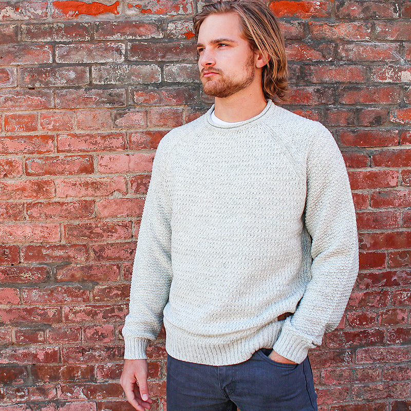 male model of emerald isle kenmare winter white crew neck sweater