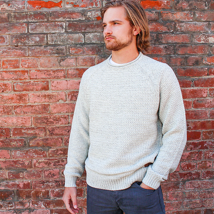 male model of emerald isle kenmare winter white crew neck sweater