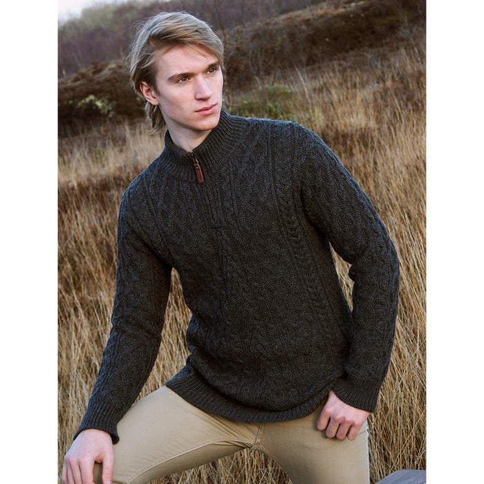 model of charcoal half zip aran sweater for men by west end knitwear